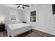 Cozy bedroom with natural light, white walls, and a comfortable bed at 214 2Nd Ave. S, North Myrtle Beach, SC 29582