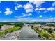 Aerial view of a condo building with a marina on the waterfront, offering scenic views at 2151 Bridge View Ct. # 1-803, North Myrtle Beach, SC 29582