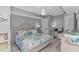 Bedroom showcases a queen bed with decorative pillows and coastal-themed bedding and decor at 2151 Bridge View Ct. # 1-803, North Myrtle Beach, SC 29582