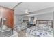 A quaint bedroom has 2 beds, a desk area and a view of the outside at 2151 Bridge View Ct. # 1-803, North Myrtle Beach, SC 29582