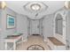 Inviting hallway with nautical decor, decorative mirror and tiled floor at 2151 Bridge View Ct. # 1-803, North Myrtle Beach, SC 29582