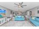 Bright living room boasts beachy decor, plush seating, and an open layout to the dining area and kitchen at 2151 Bridge View Ct. # 1-803, North Myrtle Beach, SC 29582