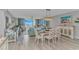 Spacious living room with ocean view, dining area and comfortable furnishings at 2151 Bridge View Ct. # 1-803, North Myrtle Beach, SC 29582