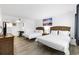 The room has two beds with matching headboards, a TV on the bureau and light colored hard wood floors at 2600 S Ocean Blvd. # 215, Myrtle Beach, SC 29577