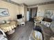 Comfortable living room with adjacent dining area and access to the kitchen at 2708 S Ocean Blvd. S # 302, Myrtle Beach, SC 29577