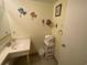 Bright bathroom featuring a sink with stack of white towels at 2708 S South Ocean Blvd. # 102, Myrtle Beach, SC 29577