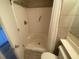 Bright bathroom with a tiled shower and neutral walls at 2708 S South Ocean Blvd. # 102, Myrtle Beach, SC 29577