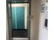 Interior view of the elevator, with a blue back wall and a guide showing where to exit during a fire at 2708 S South Ocean Blvd. # 102, Myrtle Beach, SC 29577