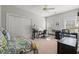 Spacious bedroom with a dedicated desk area, ideal for work or study, enhanced by natural light at 30 Baldwin Loop, Pawleys Island, SC 29585