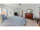 Comfortable bedroom with a large bed, dresser, and serene decor, creating a relaxing atmosphere at 30 Baldwin Loop, Pawleys Island, SC 29585