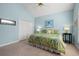 Cozy bedroom with a vaulted ceiling, large bed, and serene color palette, ideal for relaxation at 30 Baldwin Loop, Pawleys Island, SC 29585
