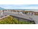 Beautiful outdoor deck overlooking the ocean with multiple seating areas to enjoy the view at 30 Baldwin Loop, Pawleys Island, SC 29585