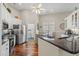 Modern kitchen with granite counters, stainless appliances, and ample cabinet space and breakfast nook at 30 Baldwin Loop, Pawleys Island, SC 29585