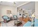 Inviting living room with hardwood floors and nice natural light at 30 Baldwin Loop, Pawleys Island, SC 29585