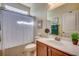 Well-lit bathroom featuring a shower and tub combo and vanity at 300 Lorenzo Dr., North Myrtle Beach, SC 29582