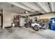 A tidy garage featuring a white golf cart, storage shelves, and access door at 300 Lorenzo Dr., North Myrtle Beach, SC 29582
