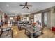 Spacious open-concept living room with hardwood floors and a view into the kitchen and outside at 300 Lorenzo Dr., North Myrtle Beach, SC 29582