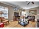 Inviting living room with hardwood floors, comfortable seating, and a large flat-screen television at 300 Lorenzo Dr., North Myrtle Beach, SC 29582