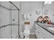 This bathroom features a tiled shower, granite countertop and gray cabinets at 3534 Pampas Dr. # 505, Myrtle Beach, SC 29577