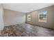 The bedroom has vinyl flooring and two windows that bring in natural light at 3685 Nichols Hwy., Aynor, SC 29511