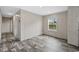This bedroom features stylish wood-look flooring and a window letting in natural light at 3685 Nichols Hwy., Aynor, SC 29511