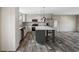 Modern kitchen with stainless steel appliances, granite countertops, and a stylish center island at 3685 Nichols Hwy., Aynor, SC 29511