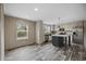 Spacious kitchen with ample cabinet space, a center island, stainless steel appliances, and wood-look flooring at 3685 Nichols Hwy., Aynor, SC 29511