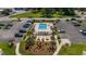 Aerial view of condo complex pool, lounge chairs and parking at 405 21St Ave. S # 1-O, North Myrtle Beach, SC 29582