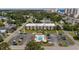 Aerial view of condo complex with pool and parking in a suburban setting near the beach at 405 21St Ave. S # 1-O, North Myrtle Beach, SC 29582