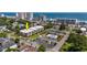Aerial view of condo complex near the beach, featuring a pool, parking, and manicured grounds at 405 21St Ave. S # 1-O, North Myrtle Beach, SC 29582