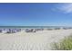 Beautiful beach view featuring clear blue sky, ocean, and beach umbrellas at 405 21St Ave. S # 1-O, North Myrtle Beach, SC 29582