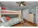 Bunk room featuring a full-size bunk bed and a dresser for ample storage space at 405 21St Ave. S # 1-O, North Myrtle Beach, SC 29582