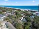 This aerial view shows the property near the beach with a mix of commercial and residential properties at 413 30Th Ave. N, Myrtle Beach, SC 29577