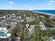 Enjoy this aerial view of the property near the beach and all of the shopping and businesses along the main throughfare at 413 30Th Ave. N, Myrtle Beach, SC 29577