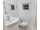Bright bathroom with a vanity, toilet, and walk-in shower offering practical and functional features at 413 30Th Ave. N, Myrtle Beach, SC 29577