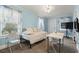Bright bedroom featuring beachy decor, ample natural light, and a versatile layout for a cozy living space at 413 30Th Ave. N, Myrtle Beach, SC 29577
