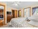 Well-lit bedroom with natural light, a dresser, and access to closet and bathroom at 413 30Th Ave. N, Myrtle Beach, SC 29577