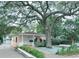 Charming single-story home with a well-maintained lawn and beautiful, mature shade tree at 413 30Th Ave. N, Myrtle Beach, SC 29577
