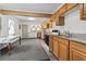 Spacious kitchen featuring wood cabinets, essential appliances, and an open layout at 413 30Th Ave. N, Myrtle Beach, SC 29577