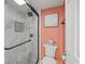 Updated bathroom boasts a modern shower with sleek glass doors and tiled walls at 4222 Pinehurst Dr. # I-9, Little River, SC 29566
