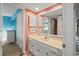 Bathroom with a spacious vanity, framed mirror and ample lighting at 4222 Pinehurst Dr. # I-9, Little River, SC 29566