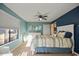 Tranquil bedroom with natural light, ceiling fan, and serene blue decor offers a relaxing retreat at 4222 Pinehurst Dr. # I-9, Little River, SC 29566