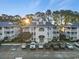 Well-maintained condo complex with neat landscaping, parking, and nearby mature trees at 4222 Pinehurst Dr. # I-9, Little River, SC 29566