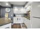 Well-equipped kitchen features white cabinets, modern appliances, and ample counter space at 4222 Pinehurst Dr. # I-9, Little River, SC 29566