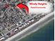 Aerial view of Windy Heights gated community near a stunning beach at 4306 Windy Heights Dr., North Myrtle Beach, SC 29582