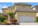 Two-story home featuring a front-entry, two-car garage and mature landscaping at 4306 Windy Heights Dr., North Myrtle Beach, SC 29582