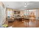 Spacious living room featuring hardwood floors, neutral tones, and lots of natural light at 4306 Windy Heights Dr., North Myrtle Beach, SC 29582