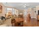 Traditional living room with hardwood floors and access to dining area and front foyer at 4306 Windy Heights Dr., North Myrtle Beach, SC 29582