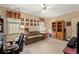 The living room offers cozy seating, built-in shelving, and ample natural light through the large windows at 4306 Windy Heights Dr., North Myrtle Beach, SC 29582