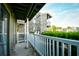 Exterior view of balcony, showing brick and siding, and lush landscaping at 4717 Cobblestone Ln. # B3, Myrtle Beach, SC 29577